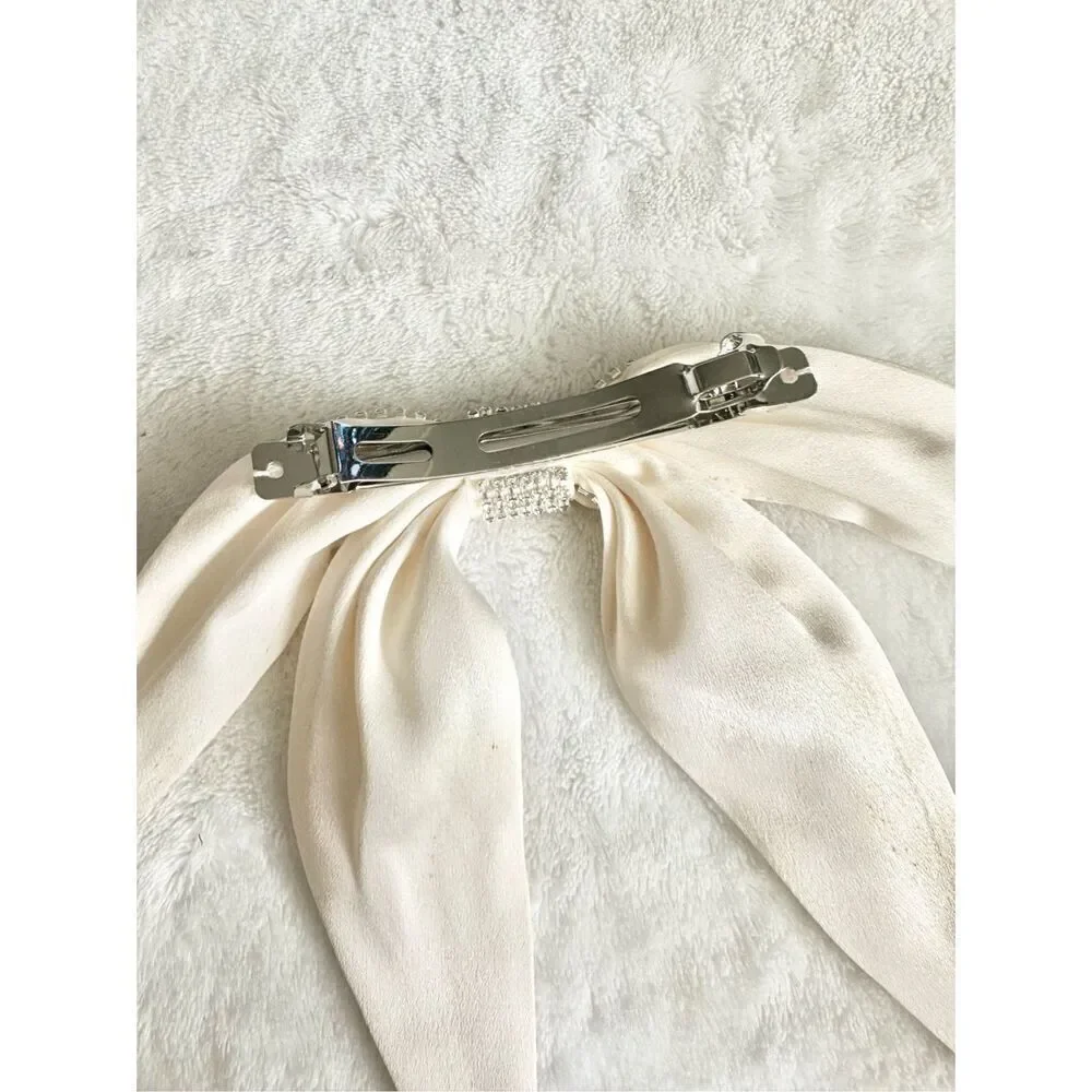 Off white rhinestone embellished hair bow